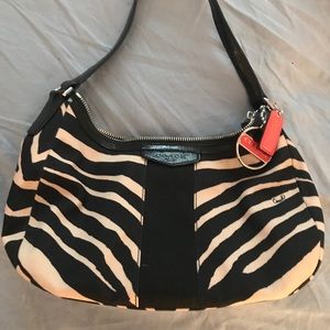 Coach purse with accessories.